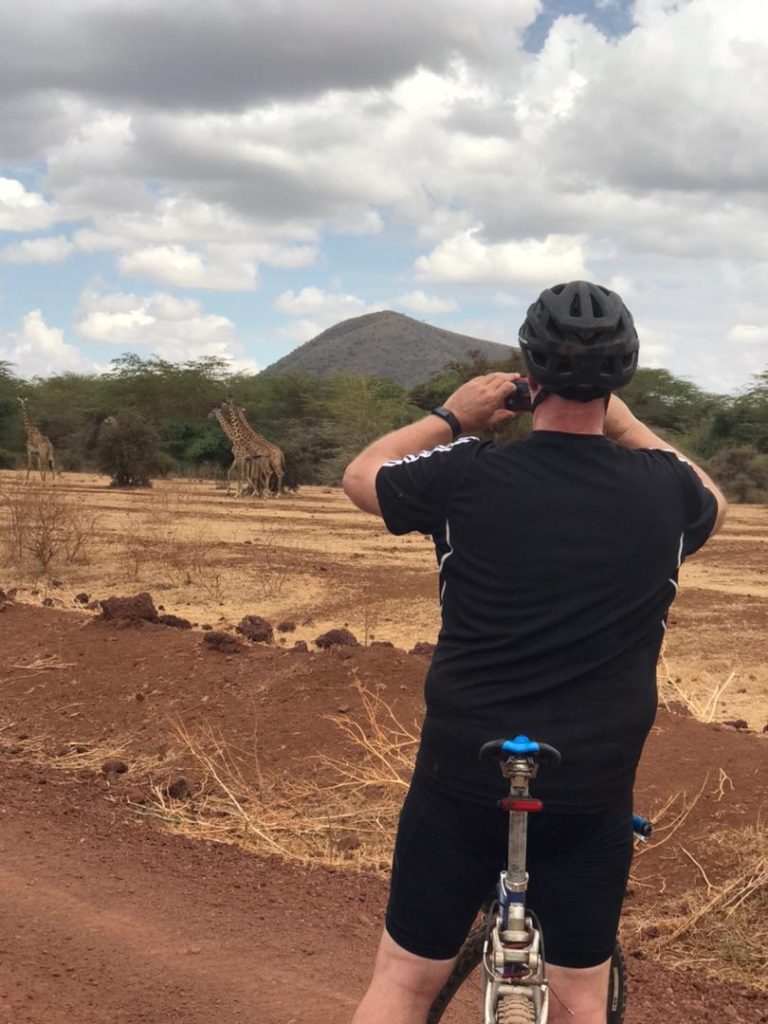 giraffe and zebra can be seen on this bike safari
